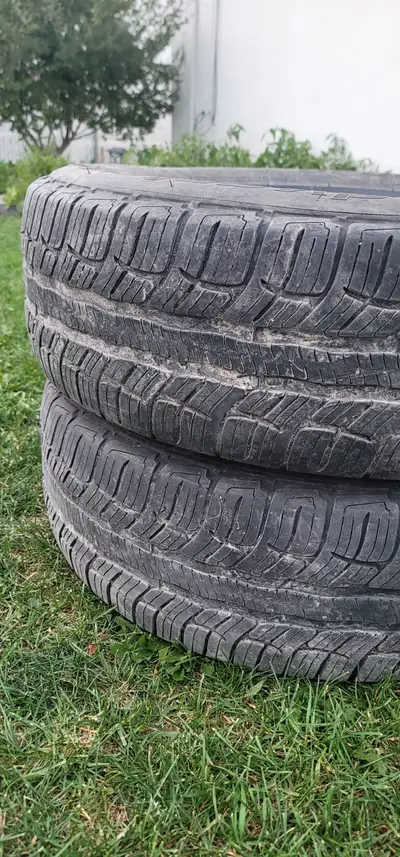 two 245/60r18 all weather tires
