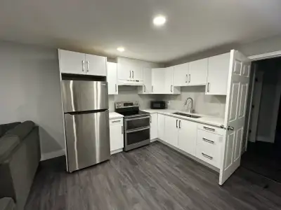 2 bedroom 1 bath ground level entry basement suite with an updated modern kitchen and its own laundr...