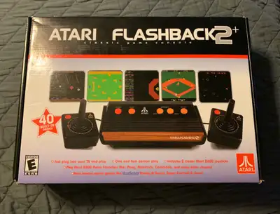 Atari flashback 2+ Plus. 40 Built-in Games. Mint condition Fames include 3D Tic Tac Toe, Adventure,...