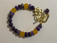 Handmade jewelry. Bracelets with amethyst, yellow Jade beads