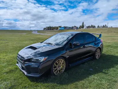 ALL STOCK NO MODS - NO ACCIDENTS Selling my STI, going to be starting a family with my woman soon an...