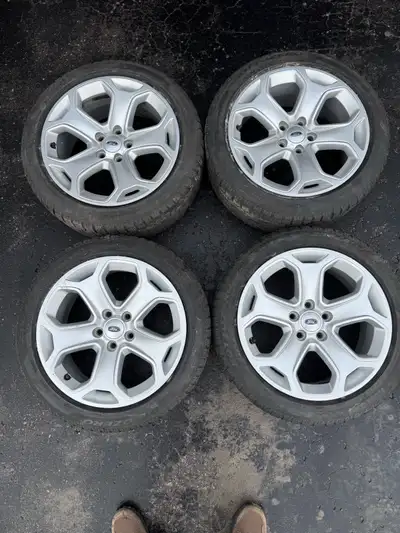 OEM Ford Escape Rims w/ centre caps. Rim Part # BT43-1007-BA 18″ +40 offset 5×108 bolt pattern Cente...
