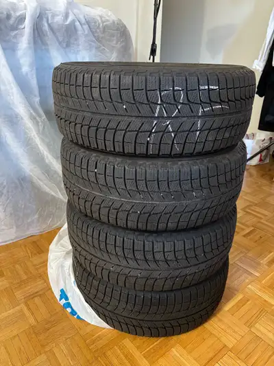 I am selling a set of four used Michelin X-Ice winter tires, sized 205/55R16, which are designed to...