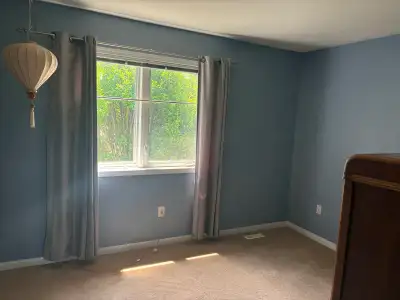 Brightly lit, private room for rent. Steps from main Bus Line, includes utilities including internet...
