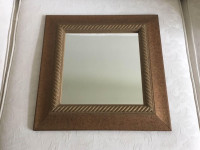 Decorative Wall Mirror with a Solid Wood Frame (from Homesense)
