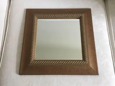 Decorative wall mirror with a solid wood frame from Homesense. 15” x 15”. Like-new condition. Change...