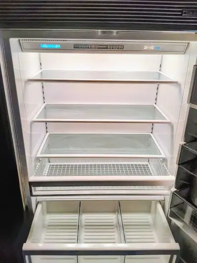 Upgrade your kitchen with this high-end appliance package featuring a pre-owned Sub-Zero built-in re...