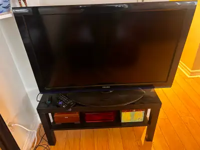 42” Toshiba tv with black stand $50, View more