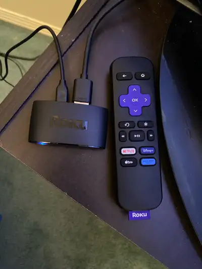 Tv and roku stick, View more