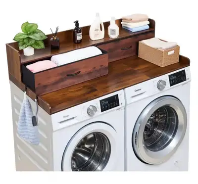 Declutter your laundry space with this Danay laundry table, designed to fit over most standard-sized...