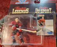 Bobby Hull and Ray Bourque figures