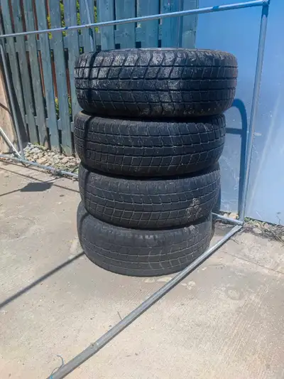 A set of winter tires with rims, in excellent working condition. The tires perform well and have no...