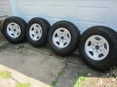 4 Bridgestone Dueller AT with rims off a 2007 chevy express 1500.Unknown bolt pitch. 4 tires bought...