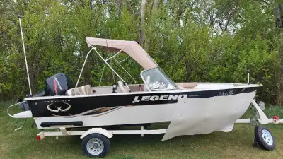 2009 Legend XCaliber 16.5' fishing boat with a 2009 Mercury 50hp, 2 stroke motor. Power trim, electr...
