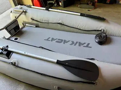Takacat Inflatable Boat Model 260LX Length 8'6". Beam 5'1". Weight 55lbs Capacity 800lbs Max hp: 8 F...