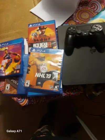 Ps4 2 controllers plus games, View more