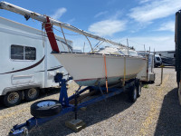 Sailboat, trailer, and motor