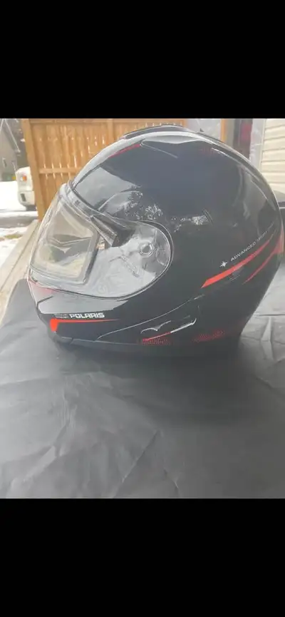 Brand new, never worn. Double electric shield, integrated sun visor, XL but fits more like a large....