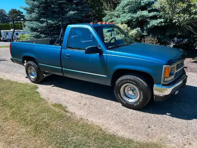 2wd long box, 350 4 sp automatic, many new parts recently, new satin finish paint, rack for kayaks o...