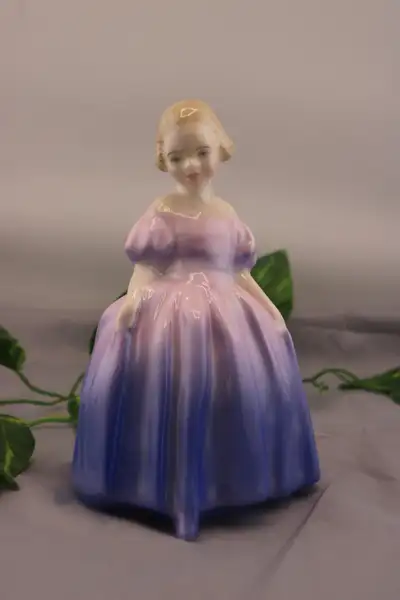 For sale A Vintage Royal Doulton HN Series porcelain figurine, circa 1970. The figurine is numbered...