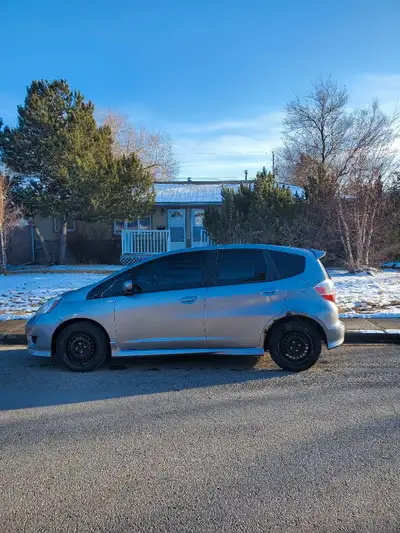 2009 Honda Fit Sport - Great on gas. - This is the Sport version so has cruise control and multi spe...