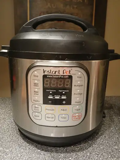 Slightly Used 3-4 times. Programmable Electric Pressure Cooker. 7 in 1. Includes Instructions and Re...
