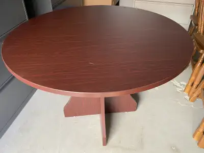 42” diameter round conference table. Approximately 30” high. Good condition.