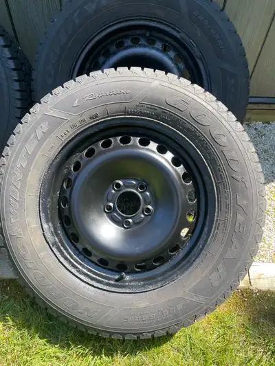 Goodyear Nordic Winter tires 225/65R16 mounted on black steel rims.