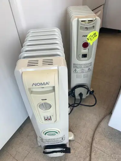 Two Noma Space Heaters,, View more