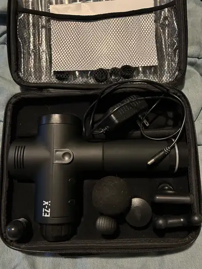 Gently used massage gun with six attachments and a carry case. $50 obo Pick up or meet downtown area