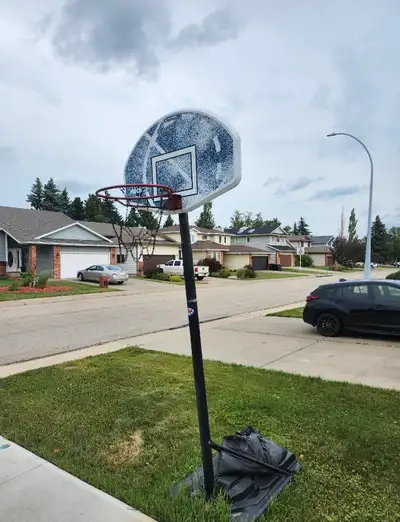Adjustable height basketball hoop Old school with real chain net $60 obo Delivery available
