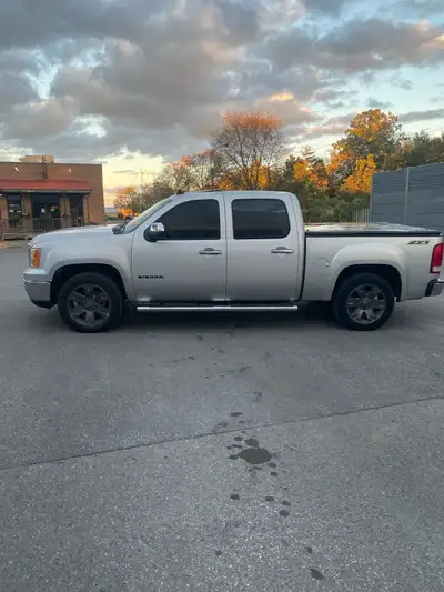 GMC in great shape full load. 5.3L with 211000km and going up as I still drive it daily only selling...