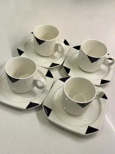 A Set of Four Elegant Coffee Cups and Saucers from an IKEA Designer Collaboration. With its timeless...