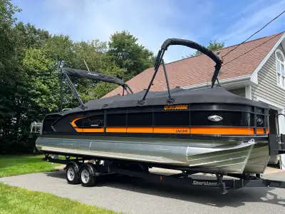 2022 Manitou SHP with a 250hp Mercury Pro XS high-performance tritoon pontoon. Luxury Manitou Encore...
