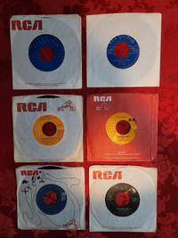 60 ELVIS PRESLEY 45 RPM RECORDS.Prices vary.let me know which on