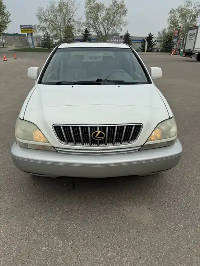 Nice, running SUV. No issue. Comes with the winter Tire summer Tire New battery Power Window power l...