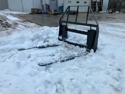 New skid steer pallet forks. 48” forks Heavy enough for medium sized skid steers I can modify to fit...