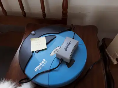 robo vacuum cleaner. has a battery but if you get a new one will charge faster 10.00 brand is discov...