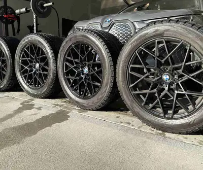 Set of 4 winter tires mounted on BMW style black rims. Tires are Yokohama IceGuard, excellent winter...
