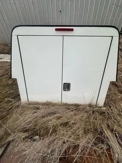 Leer Truck Hi Rise Aluminum Canopy, 32’ above box. 6’6” long, with full height rear doors. Clean in...