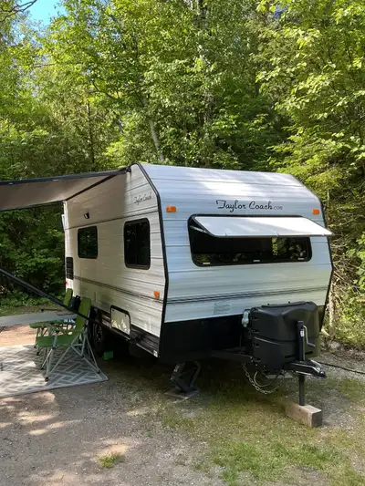 For sale is a Taylor Coach travel trailer. 2019, 17' long by 7' wide, rear door, twin beds model. Th...