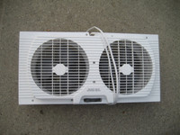 window mount fan, dual fan,10.75x21.75 inches, max adjustable wi