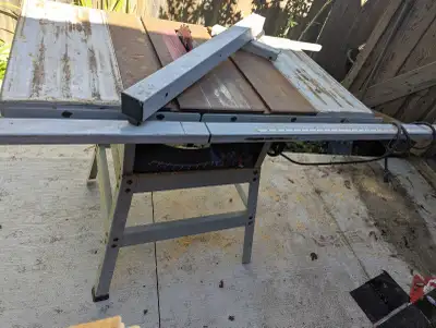 Used Must pickup and carry Bring help, is very heavy. Good working order. Comes w new blade Best rea...