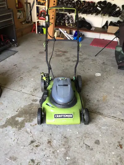 Electric Lawn Mower Works Great. 21”. Cut $50 Call 613-439-8772