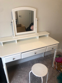 White vanity with mirror and stool