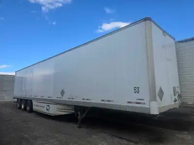 Trailer in impeccable shape, roll up door, spring ride .