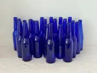 “Decorative Blue Glass Bottles” $2 each. 
