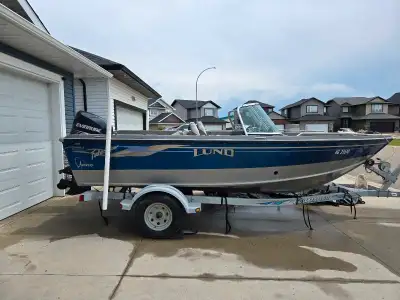 2003 Lund 1700 with Evinrude 135, View more