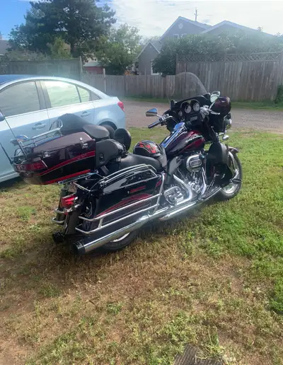 For sale is my Harley Davidson Electra Glide Ultra Classic CVO, a high-performance touring motorcycl...