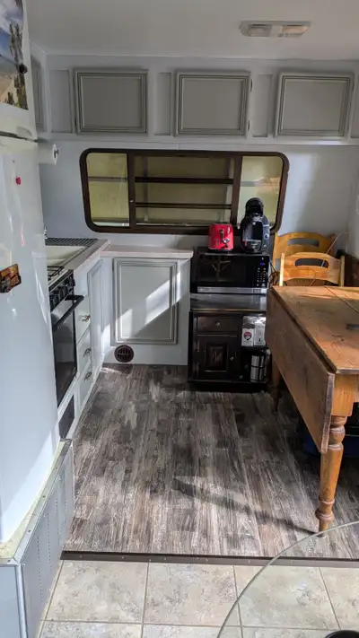 Simple, clean, renovated trailer parked permanently on the lot. Very low fee, only 2650/season plus...